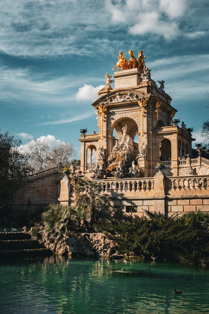 Explore the stunning architecture and serene surroundings of Barcelona's iconic Cascada Monument in Ciutadella Park.