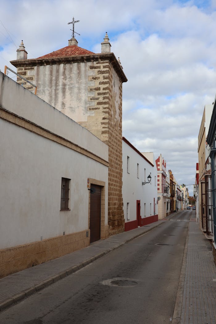 Explore the picturesque and historic street of Puerto Real, showcasing unique architecture and cultural charm.
